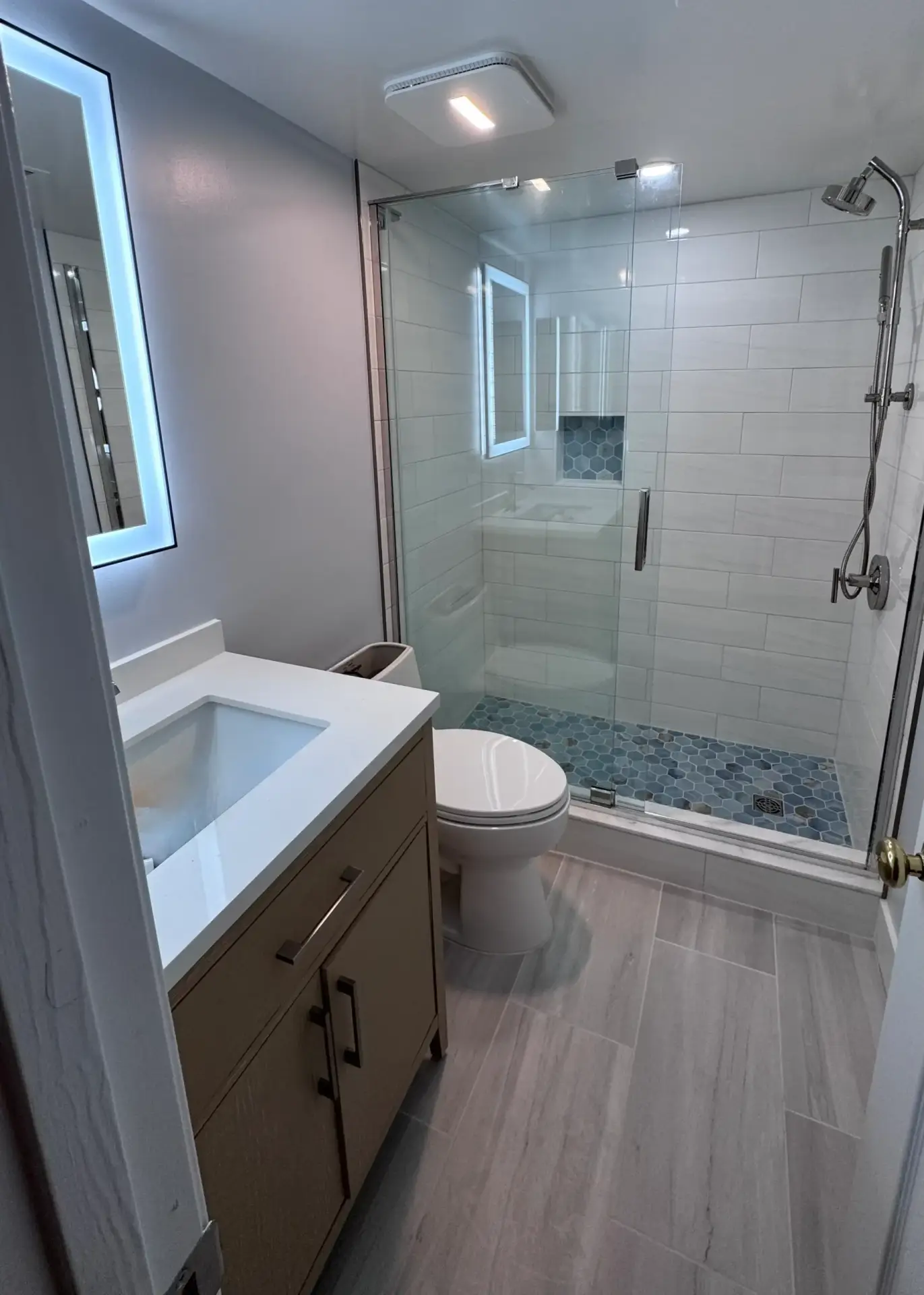 Basement bathroom remodeling in Arlington VA — clean modern finished basement bathroom