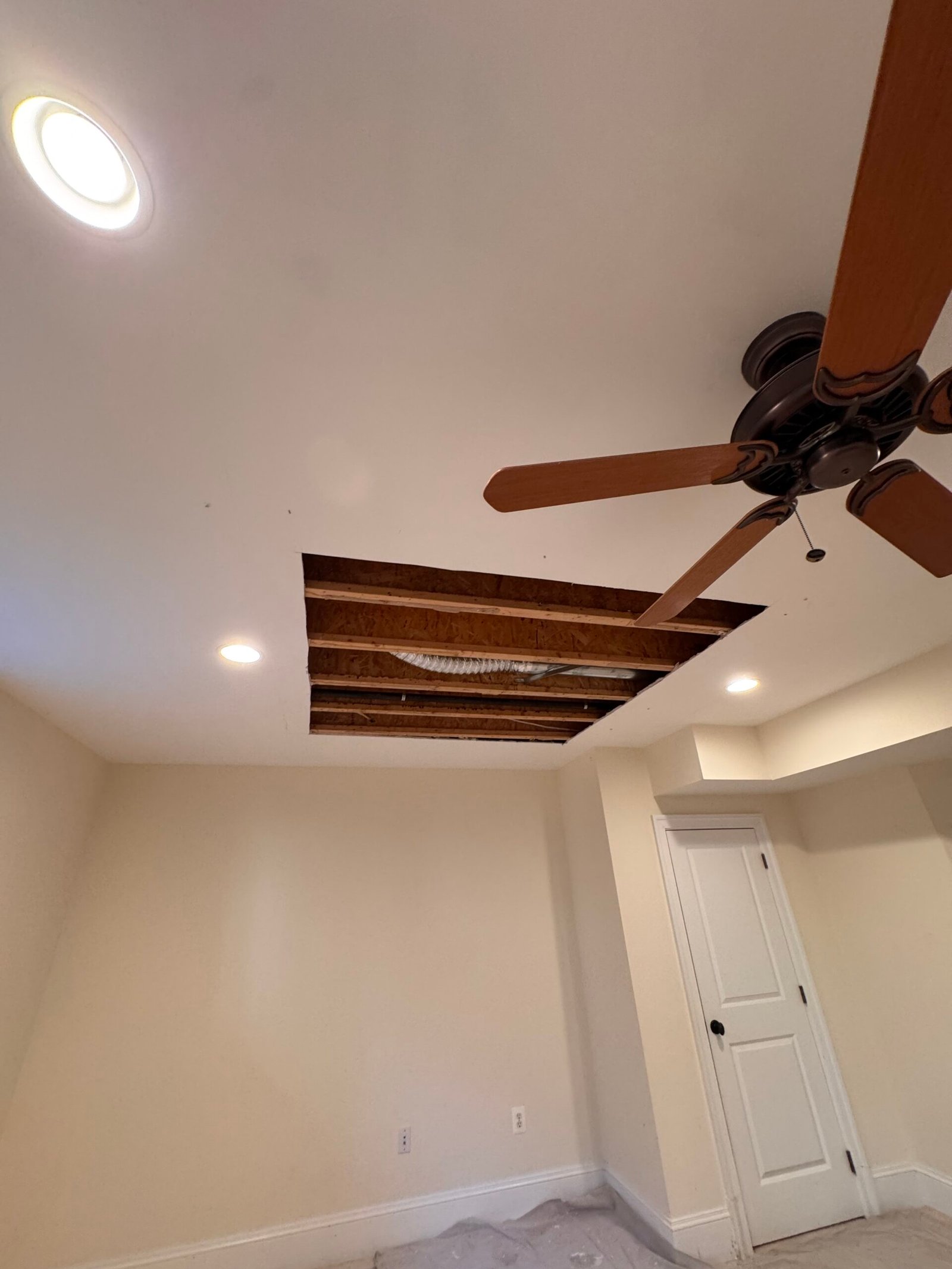 Water-damaged ceiling drywall before repair in Arlington, VA