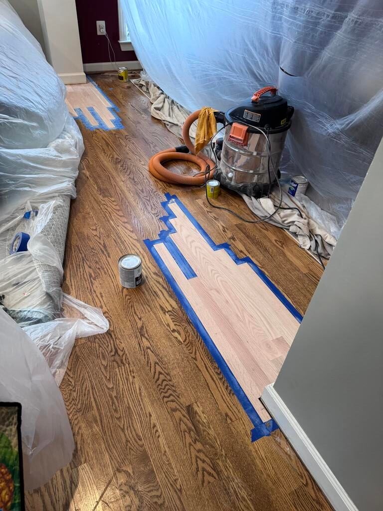 Hardwood floor repair in progress after column removal in Arlington, VA