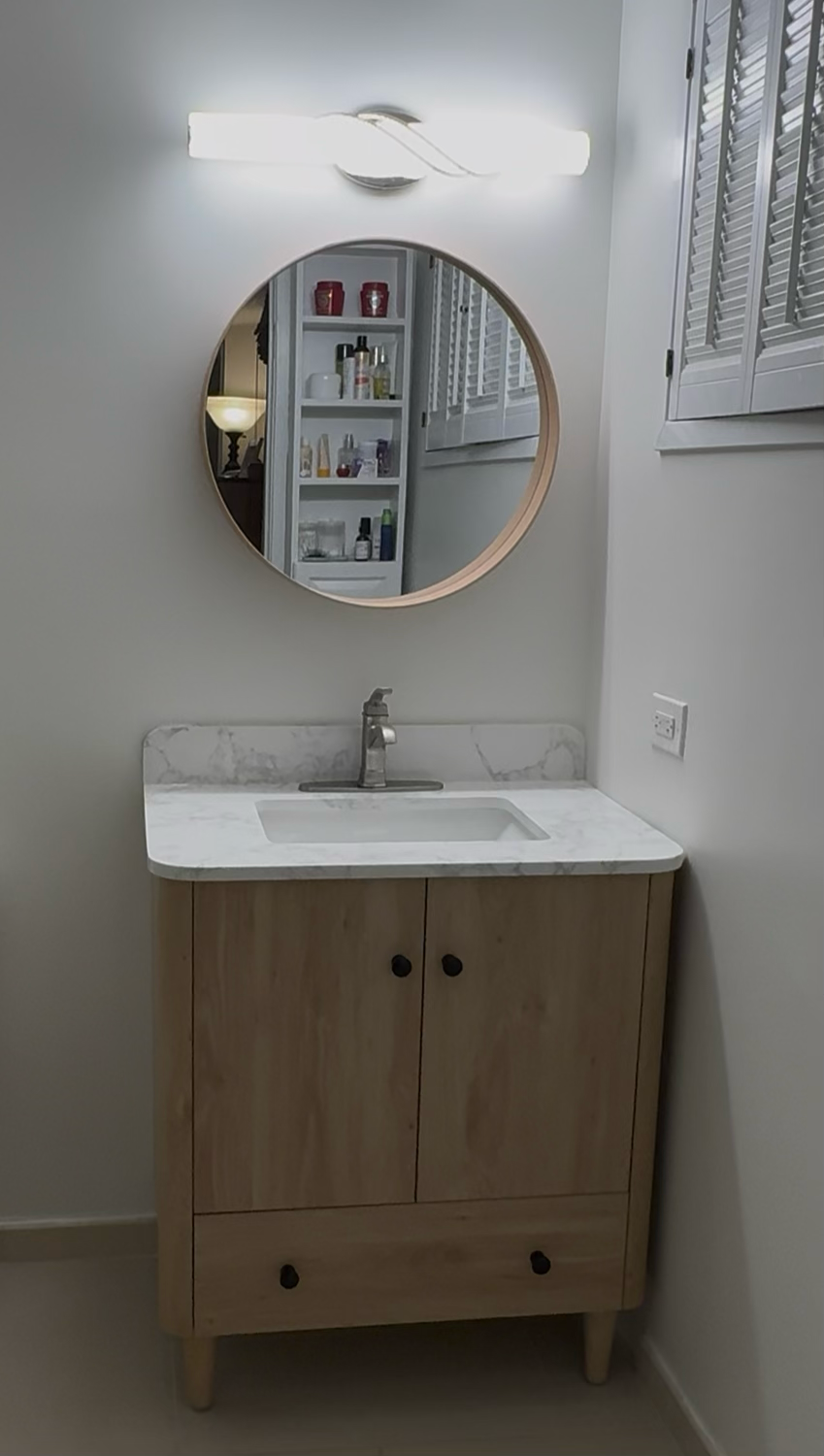 Bathroom vanity, mirror and light fixture installation in Arlington VA